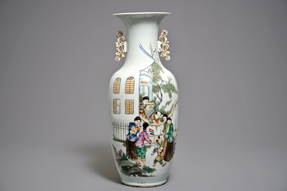 A Chinese famille rose vase with ladies with children, 1st half 20th C.