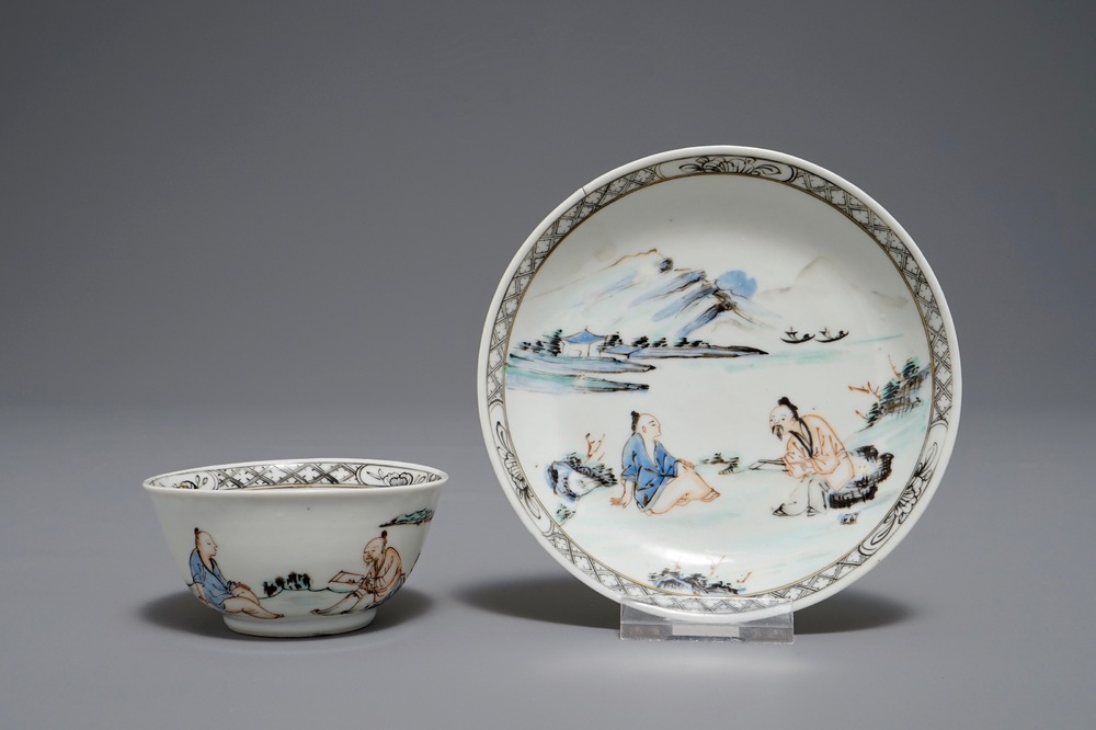A Chinese cup and saucer with two figures in a landscape, Yongzheng