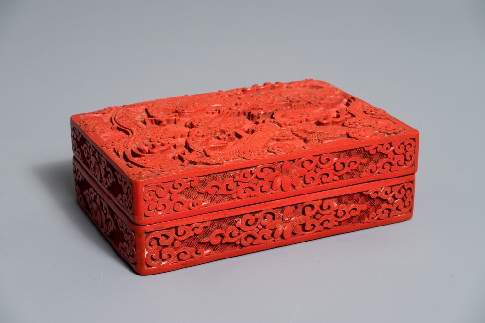 A rectangular Chinese cinnabar lacquer box and cover with dragons, 19th C.