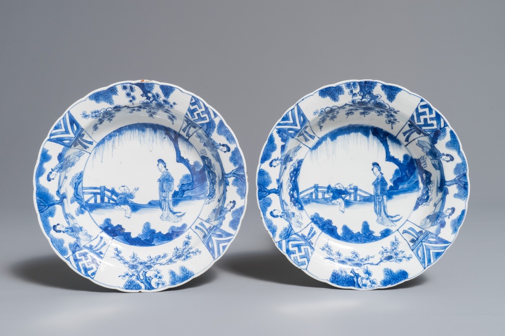 A pair of Chinese blue and white deep plates with Long Eliza and a boy, Kangxi