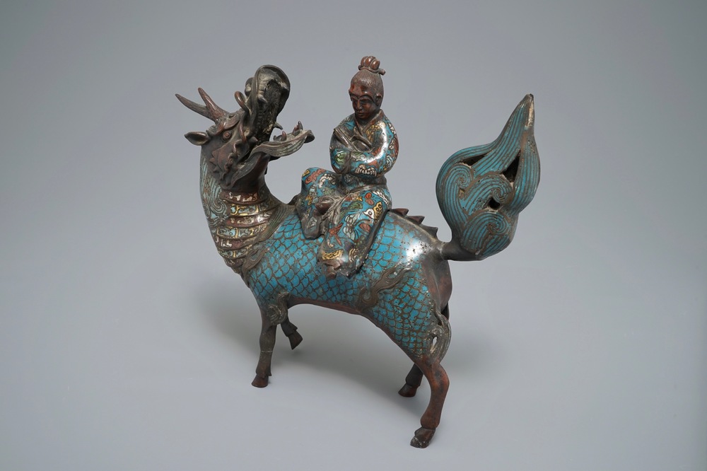 A Chinese bronze and cloisonn&eacute; incense burner shaped as a sage on a qilin, seal mark, 19th C.