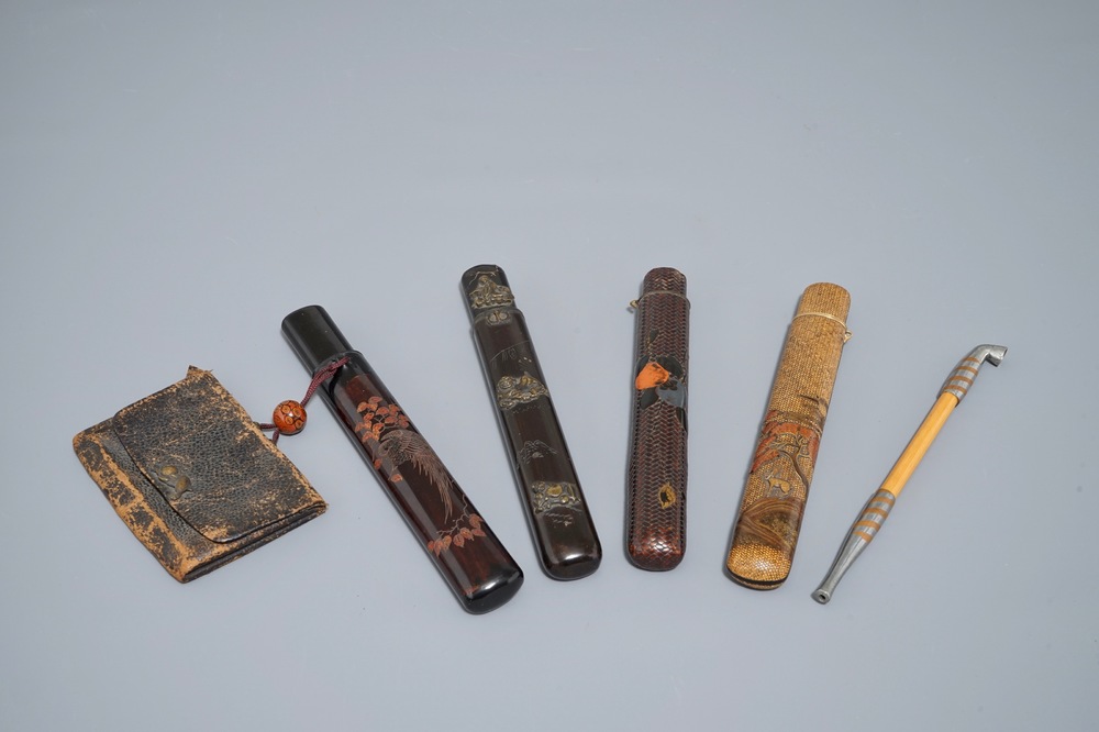 Four Japanese kiseru or tobacco pipe cases, a pipe and a pouch, Meiji, 19th C.