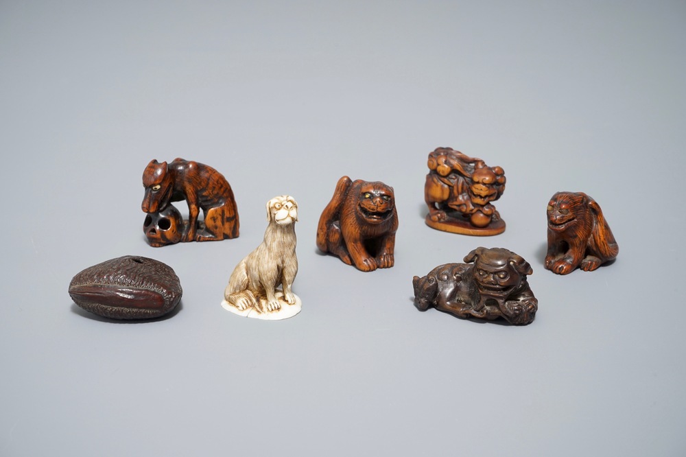 Seven Japanese carved wood and ivory netsuke and okimono, Japan, Meiji, 19/20th C.