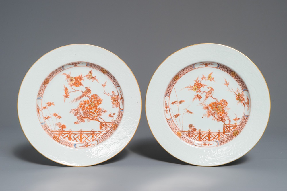 A pair of Chinese iron red and gilt plates with inscised underglazed design, Qianlong