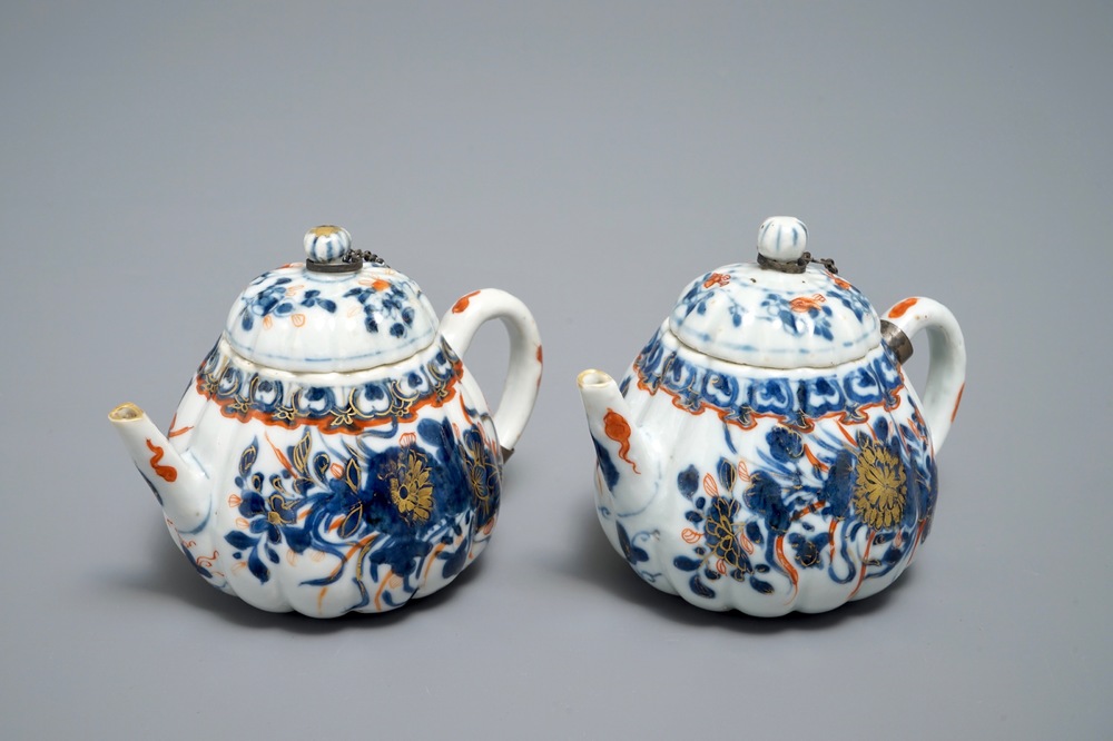 A pair of Chinese Imari style teapots and covers, Kangxi