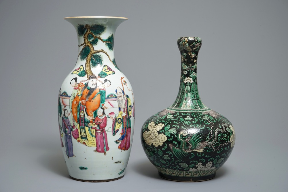 A Chinese famille noire garlic mouth vase and a famille rose vase with large figures, 19th C.