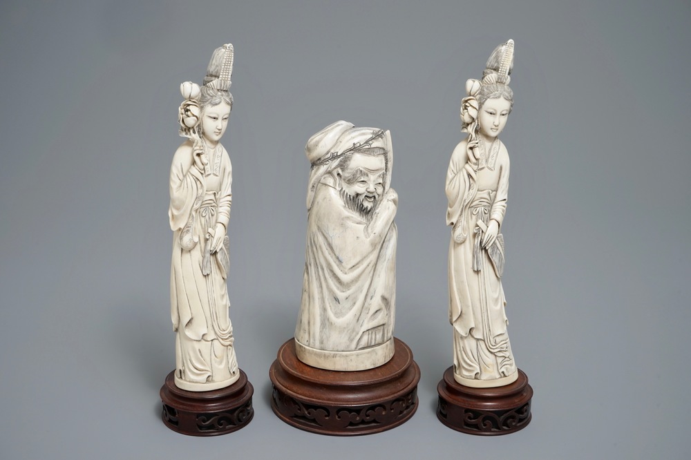 Three Chinese carved ivory figures of ladies and of an immortal, 2nd half 19th C.