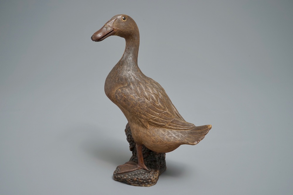 A Chinese Shiwan pottery model of a duck, 19/20th C.