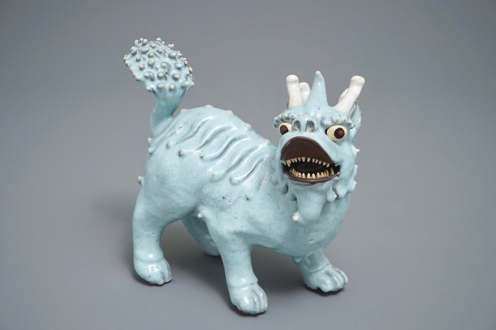 A Chinese Shiwan glazed pottery model of a qilin, 19/20th C.