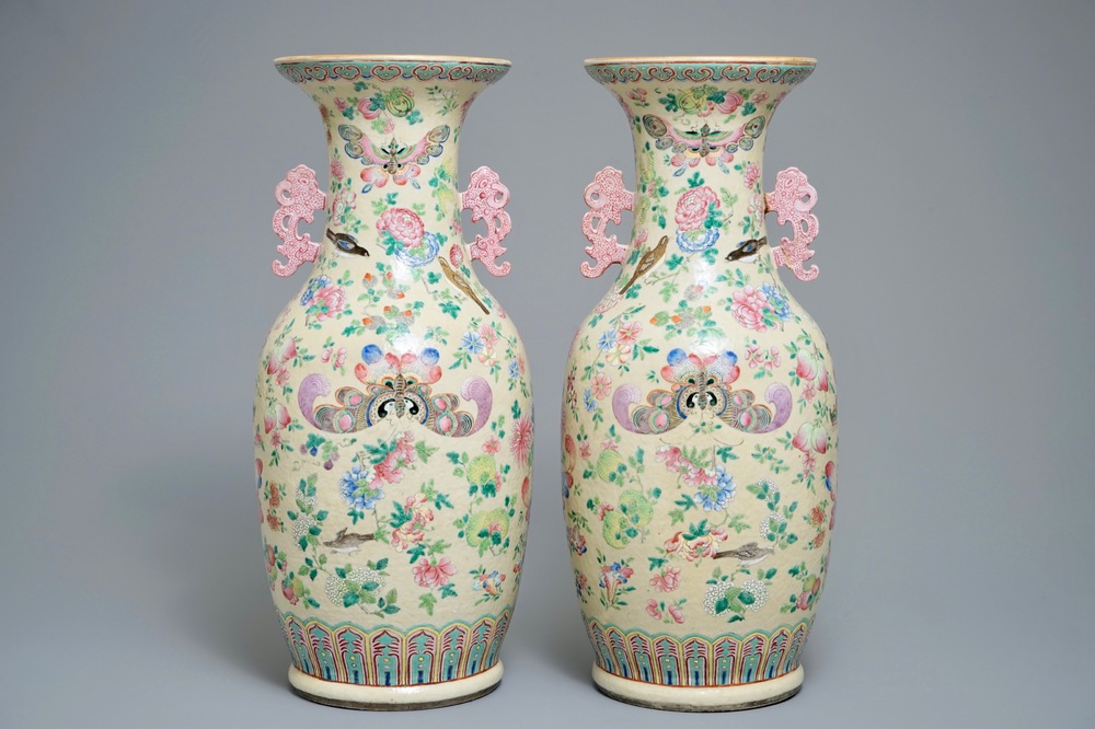 A pair of Chinese famille rose cream-ground butterfly vases, 19th C.