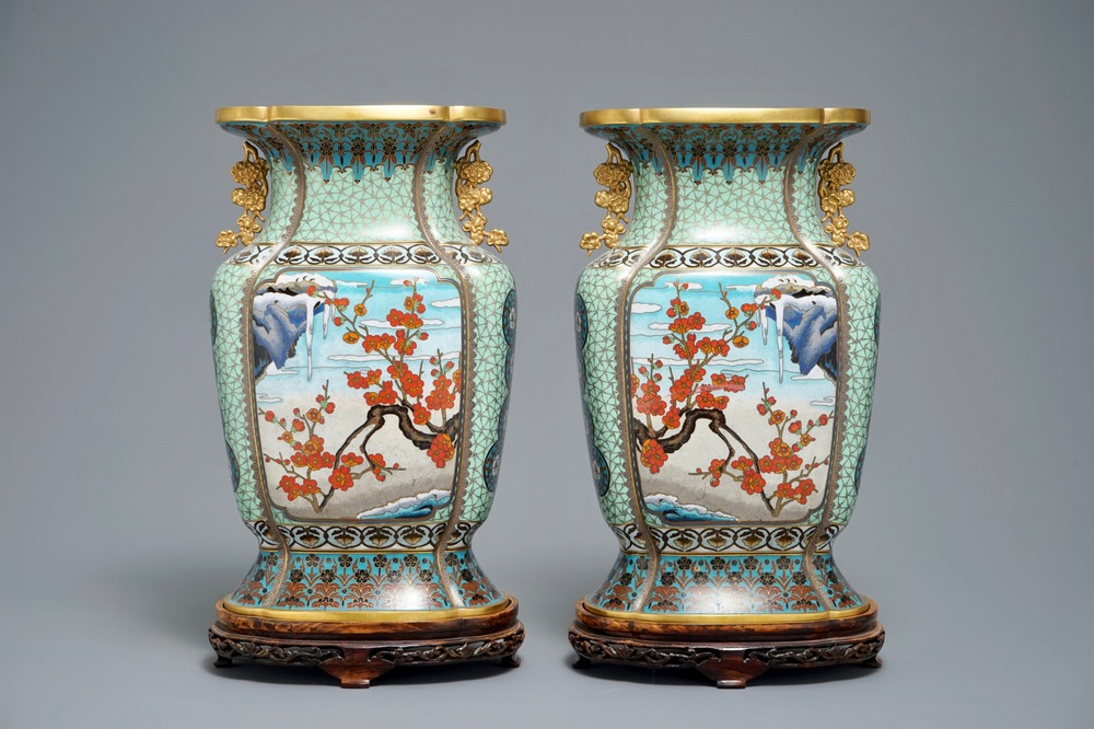 A pair of Chinese parcel-gilt cloisonn&eacute; vases on wooden stands, 1st half 20th C.