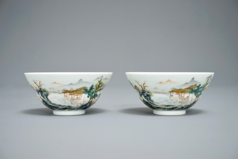 A pair of Chinese famille rose tea bowls with a landscape, Qianlong mark, 20th C.