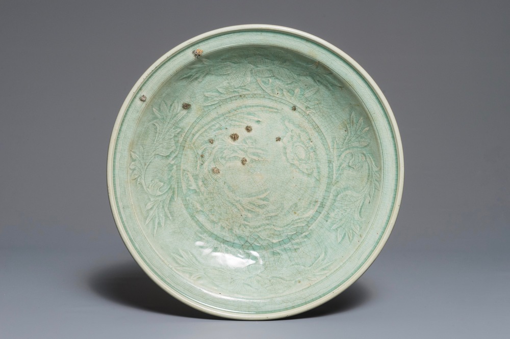 A Chinese qingbai charger with underglaze floral design, Ming