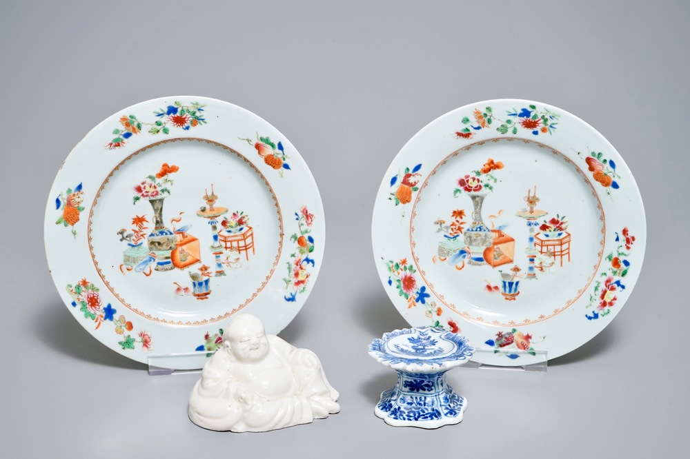 A pair of Chinese famille rose plates, a blue and white salt and a Buddha, Kangxi and later