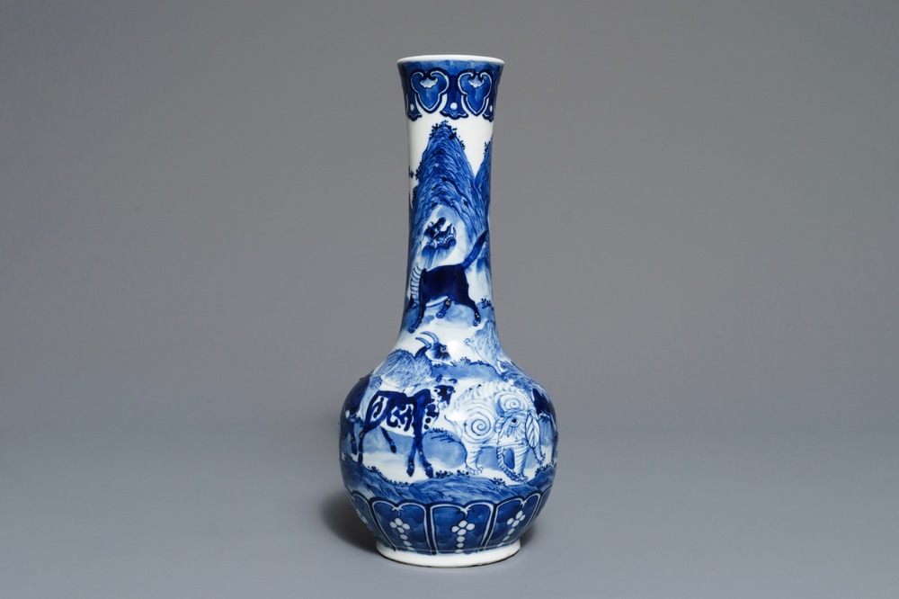 A Chinese blue and white bottle vase with animals, Xuande mark, 19th C.