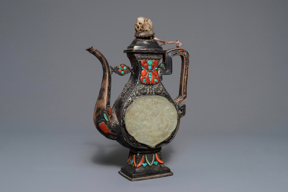 A silver-plated coral, jade and turquoise inlaid ewer and cover, Tibet or Mongolia, 19/20th C.