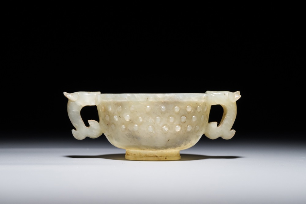 A Chinese mottled jade two-handled cup, Qing