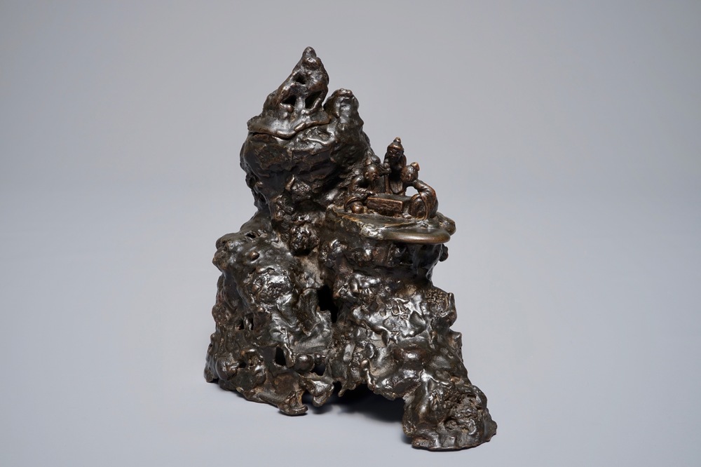 A Chinese bronze incense burner modelled as a mountain with qi-players, 18/19th C.