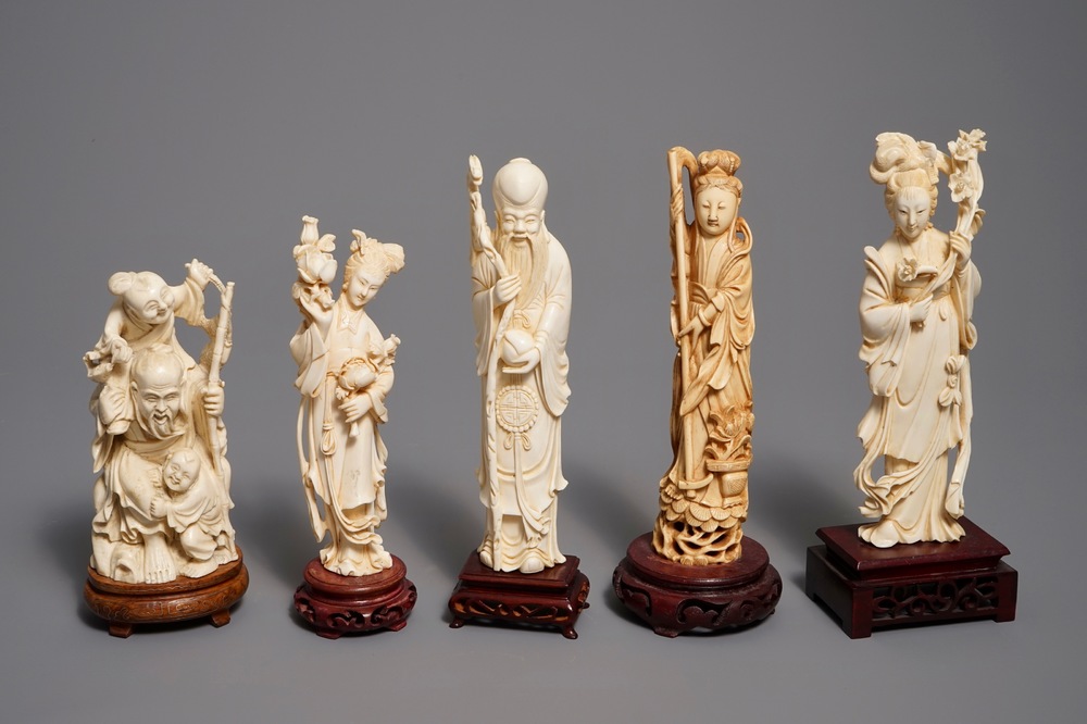 Five various Chinese carved ivory figures on wooden bases, 19/20th C.