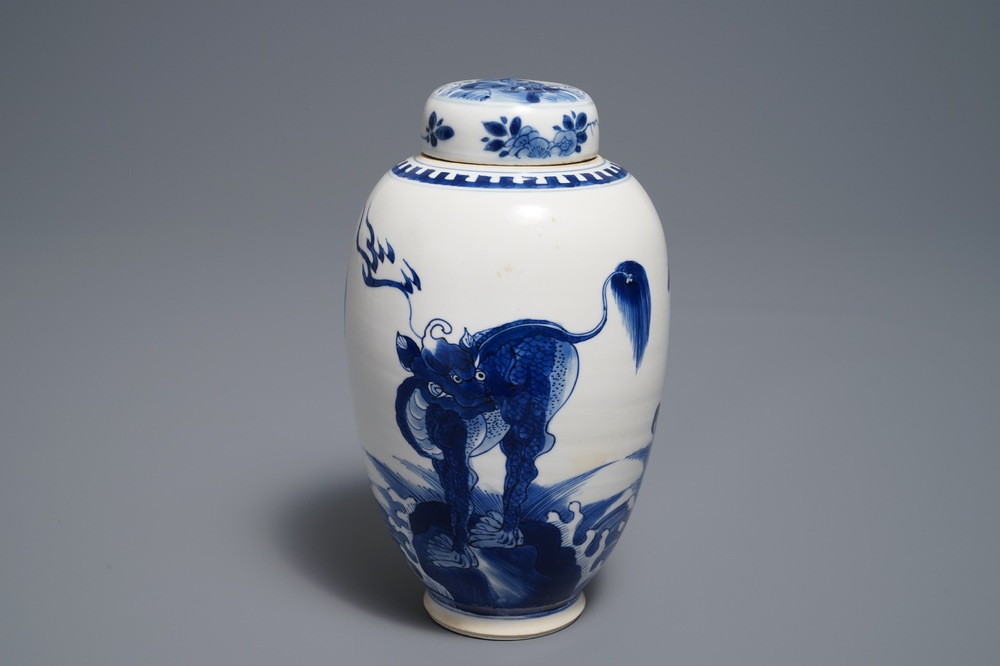 A Chinese blue and white 'mythical beasts' vase and cover, Kangxi