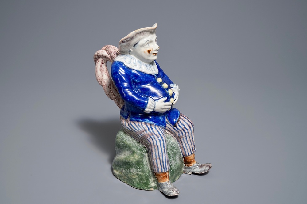 A polychrome Brussels faience figurative 'Jacquot' ewer, Stevens mark, 19th C.