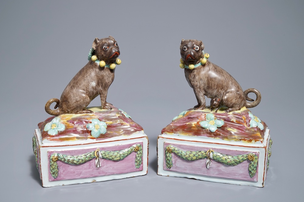 A pair of polychrome Tournai faience pugs, 18th C.