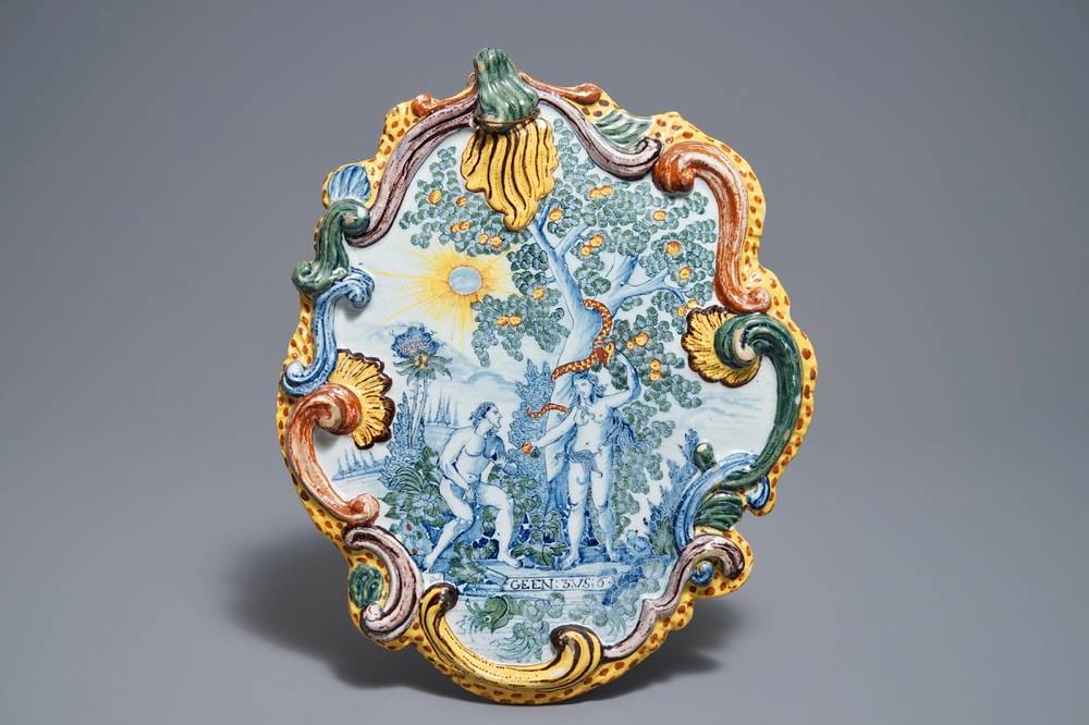 Une plaque en fa&iuml;ence polychrome de Delft &agrave; d&eacute;cor d'Adam et Eve, 18&egrave;me