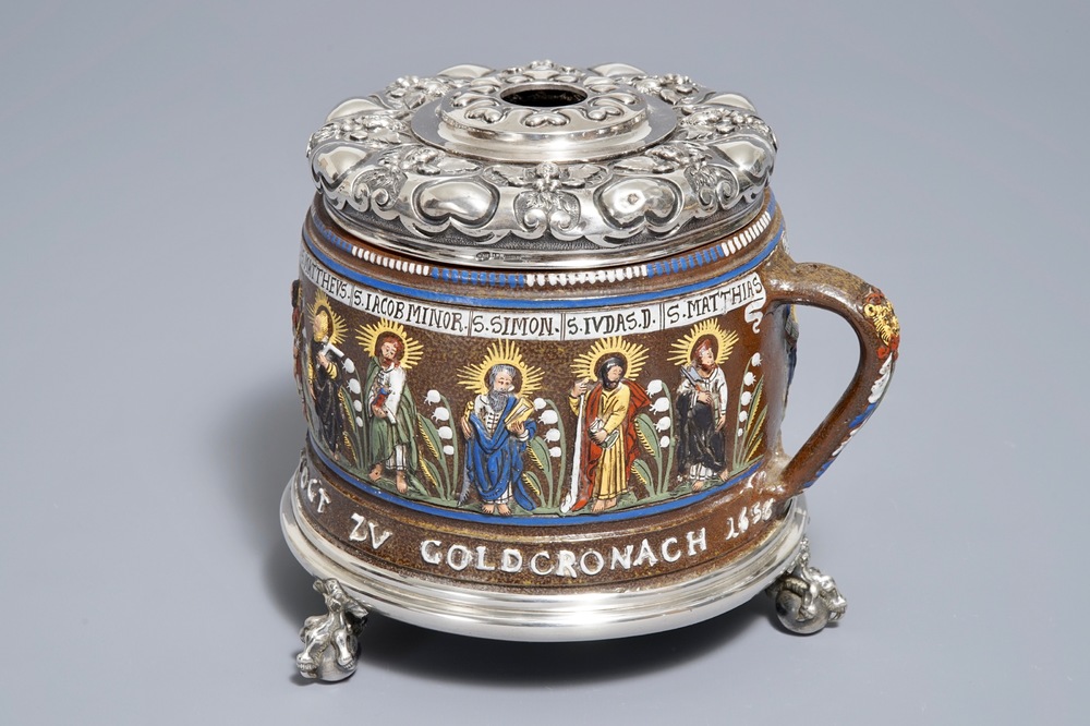 Een pul met aposteldecor in Creussen steengoed met latere Russisch zilveren Faberg&eacute;-montuur, 1656 gedateerd