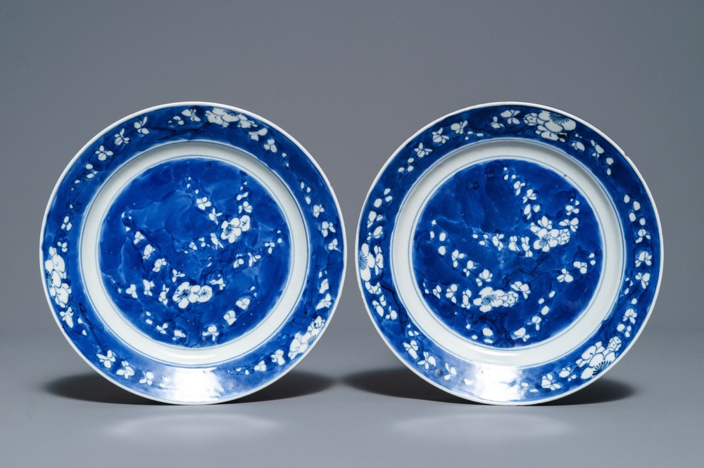 A pair of Chinese blue and white 'prunus' plates, Kangxi