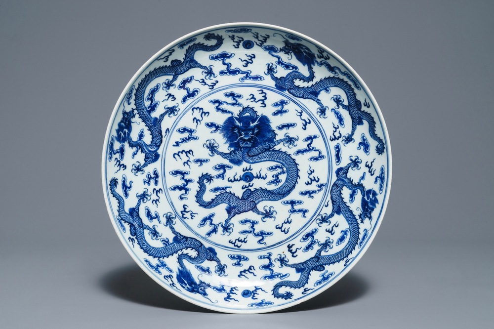 A Chinese blue and white 'dragon' dish, Qianlong mark, 19th C.