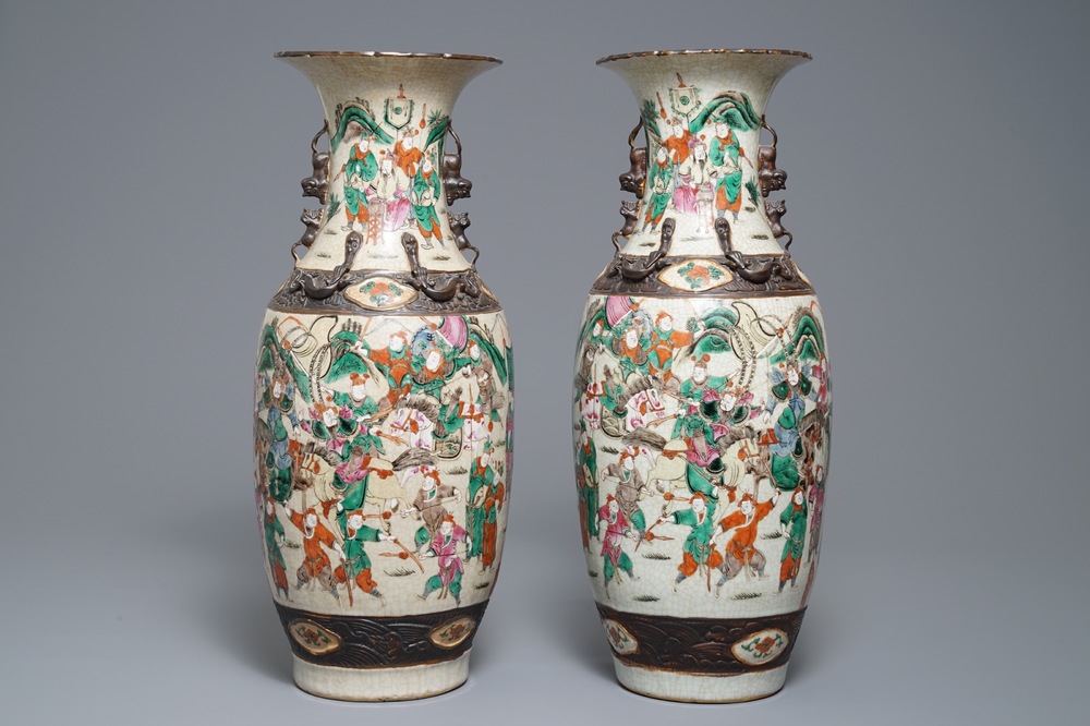 A pair of Chinese Nanking famille rose vases with warriors, 19th C.