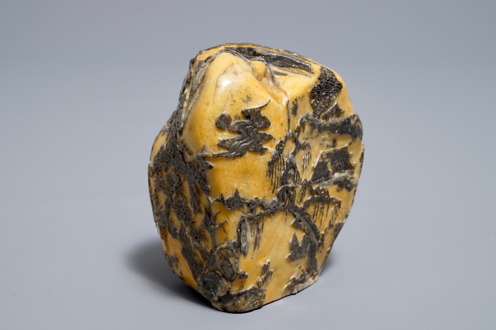 A Chinese carved Shoushan soapstone boulder with landscape design, 19/20th C.