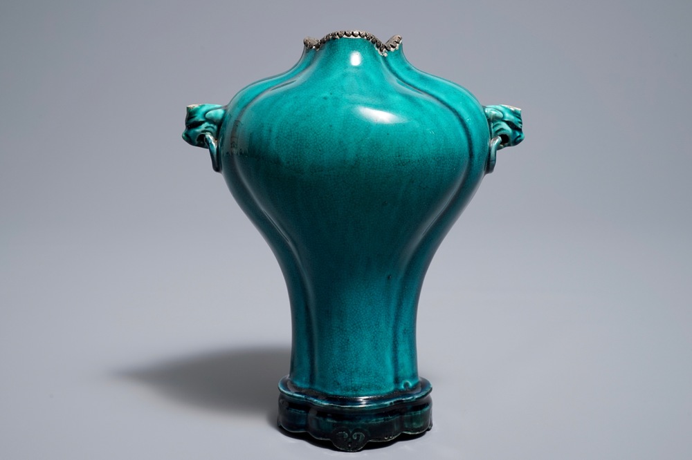 A Chinese monochrome turquoise-glazed vase on stand, 18th C.