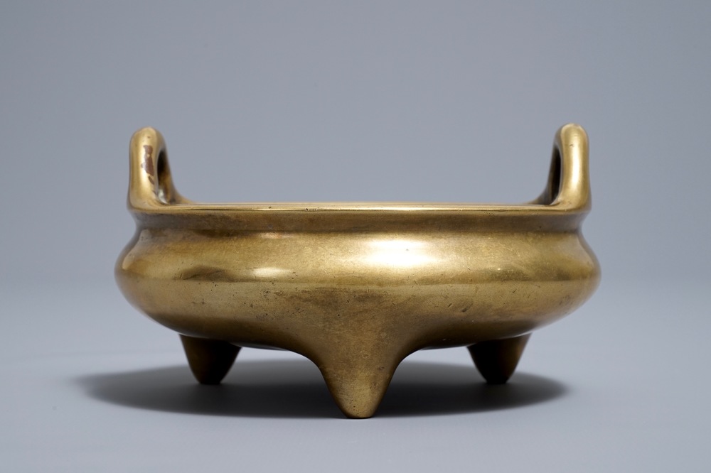 A Chinese bronze tripod censer, Xuande mark, 18th C.