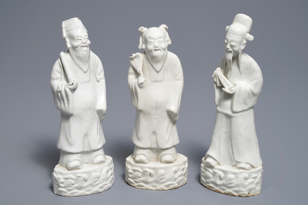 Three Chinese blanc de Chine figures of Immortals, 18/19th C.