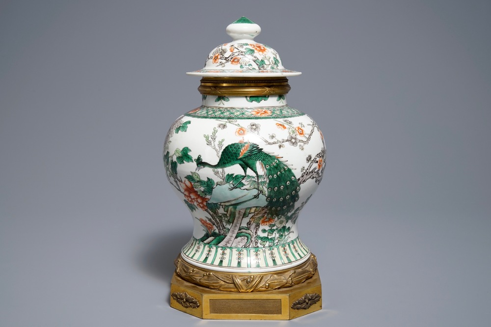 A Chinese famille verte gilt bronze-mounted vase and cover, 19th C.