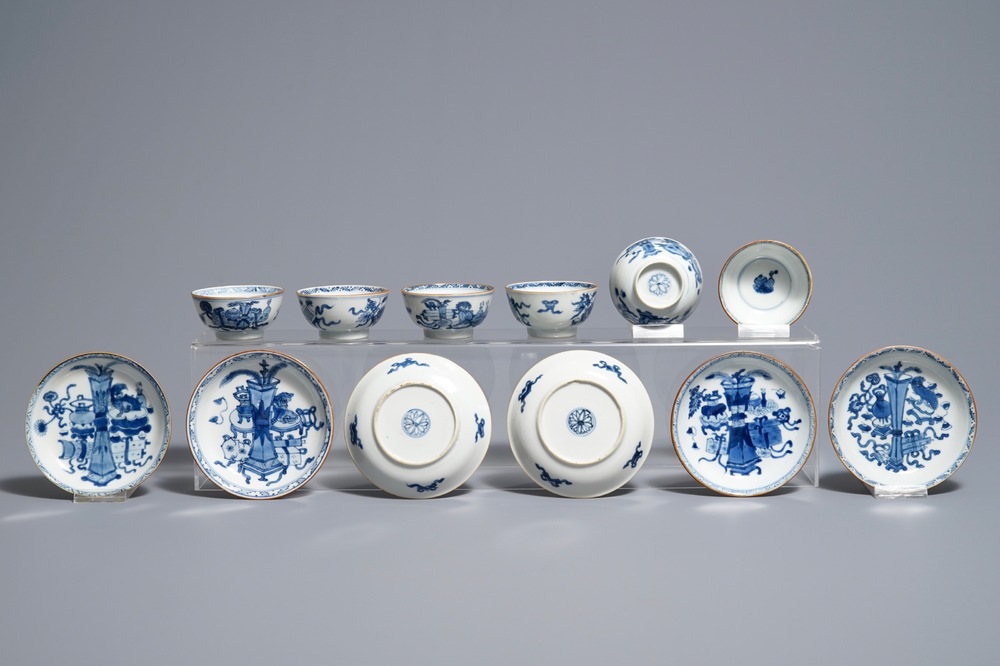 Six Chinese blue and white cups and saucers with 'antiquities' design, Kangxi