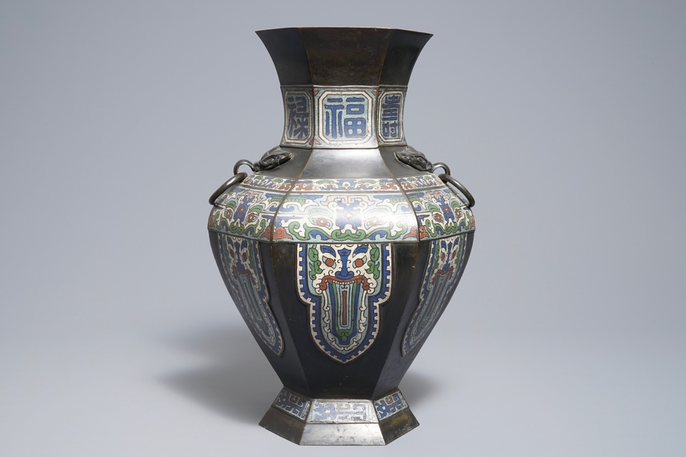 An archaic Chinese bronze and champlev&eacute; enamel vase, 19th C.