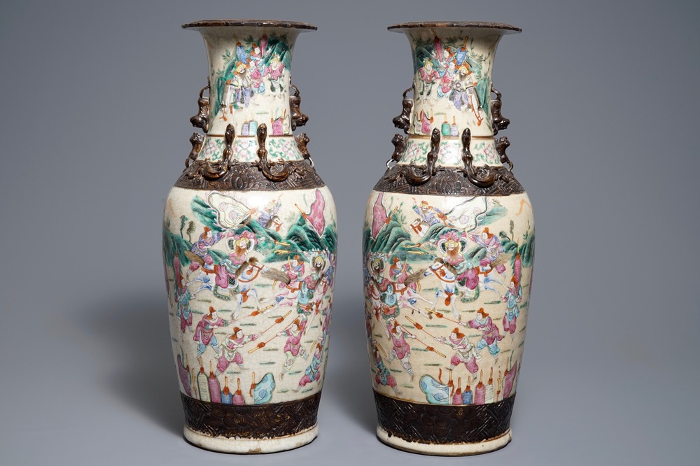 A pair of Chinese Nanking famille rose crackle-glazed vases with warriors, 19th C.