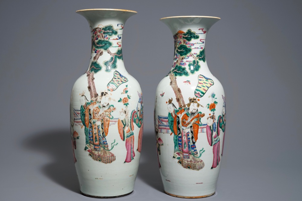 A pair of Chinese famille rose vases with figures in a garden, 19th C.