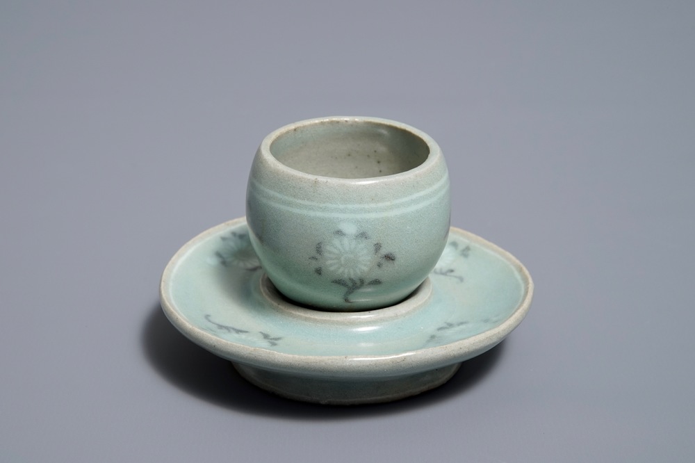 A Korean celadon-glazed decorated cup on stand, Goryeo or later