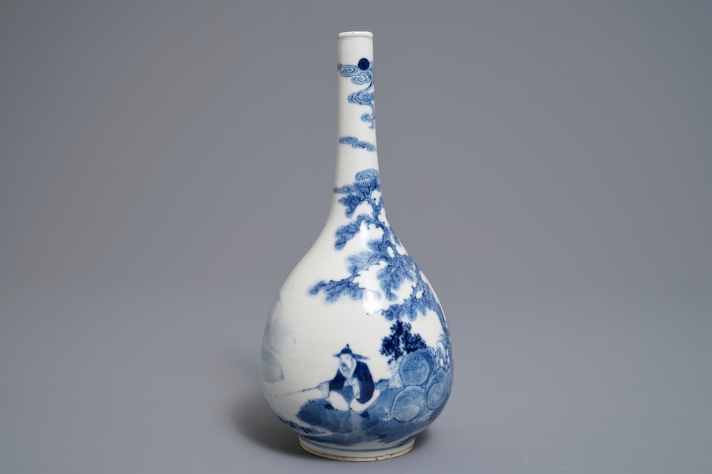 A Chinese blue and white bottle vase with a fisherman, 19th C.