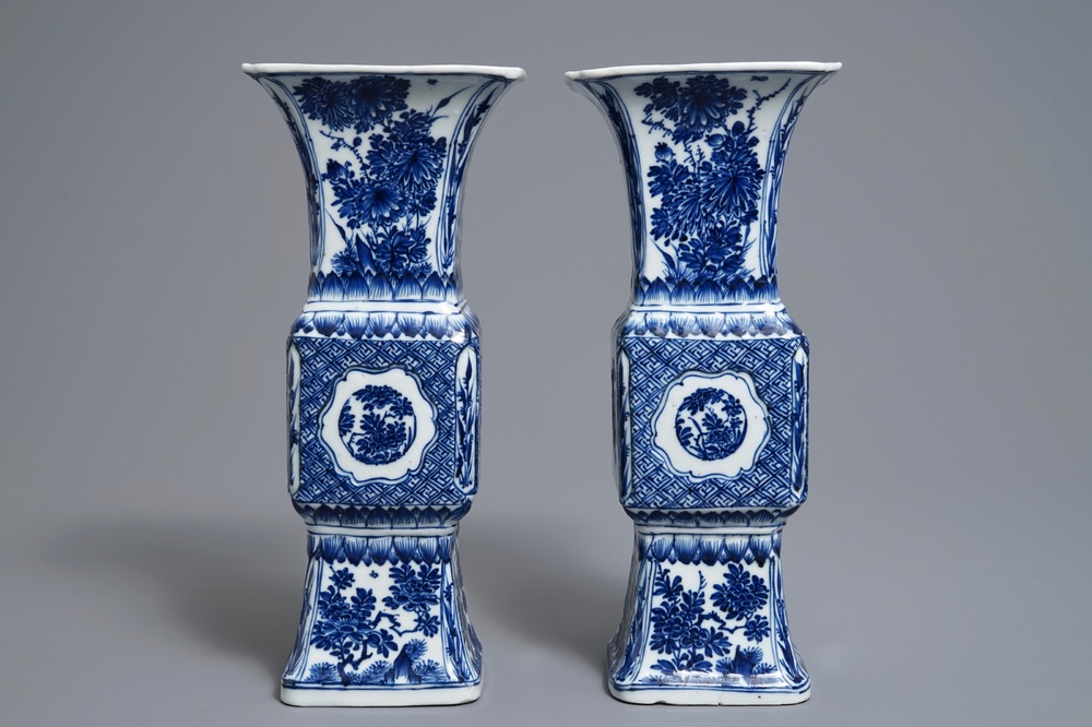 A pair of Chinese blue and white gu beaker vases, Kangxi