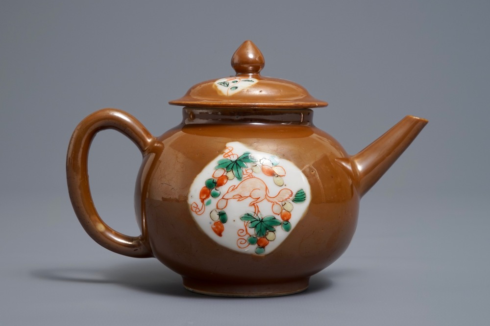 A Chinese famille verte capucin ground teapot and cover, Kangxi