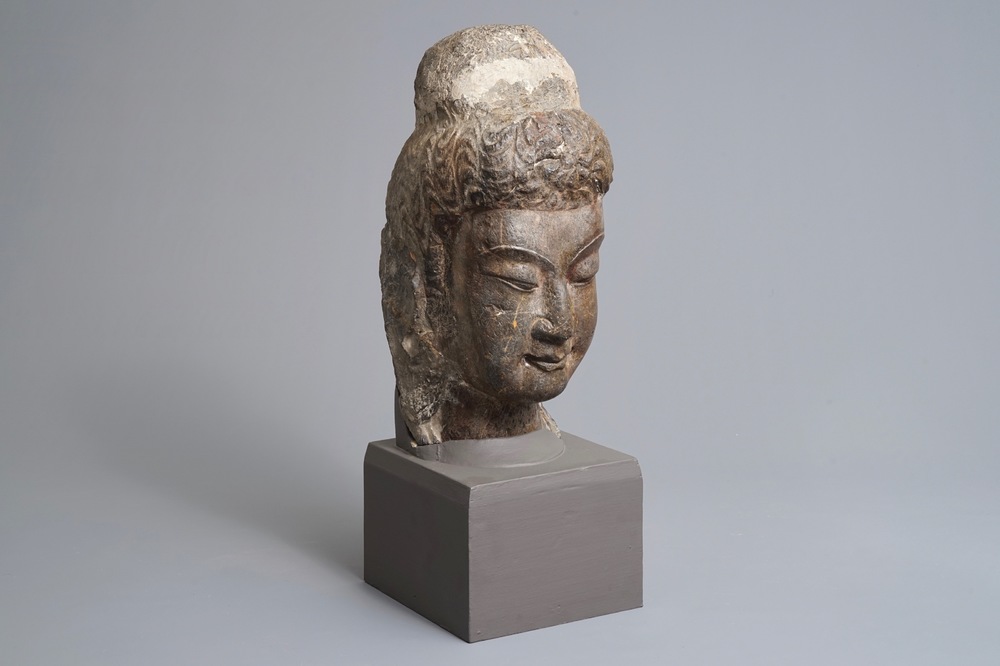 A Chinese carved limestone head of Buddha, Northern Wei (386-535)