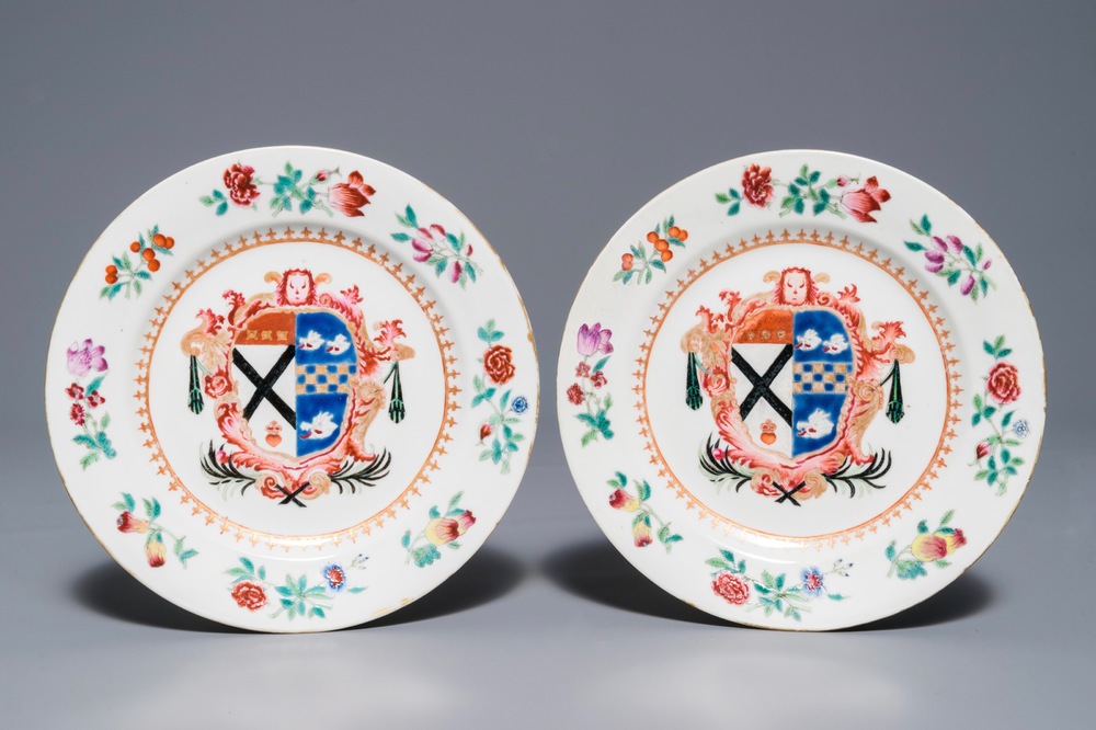 A pair of Chinese English market famille rose armorial plates, arms of Johnstone, Qianlong