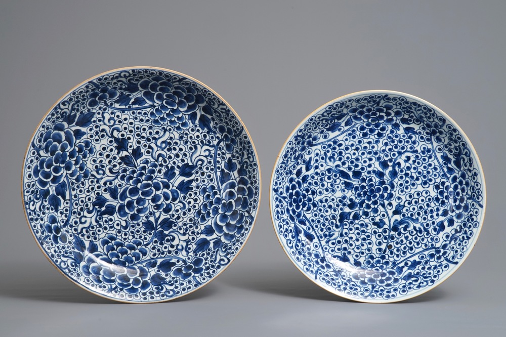 Two Chinese blue and white 'peony' chargers, Kangxi