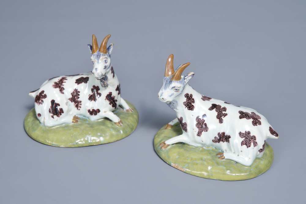 A pair of polychrome Dutch Delft models of goats, 18th C.