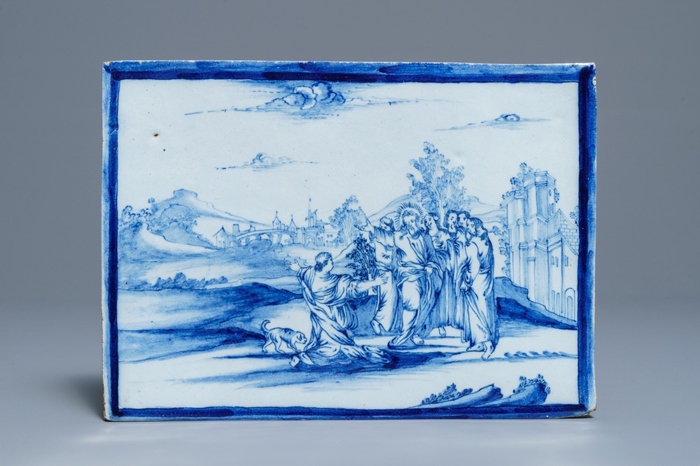 Une plaque rectangulaire en fa&iuml;ence de Delft bleu et blanc &agrave; sujet religieux, 18&egrave;me