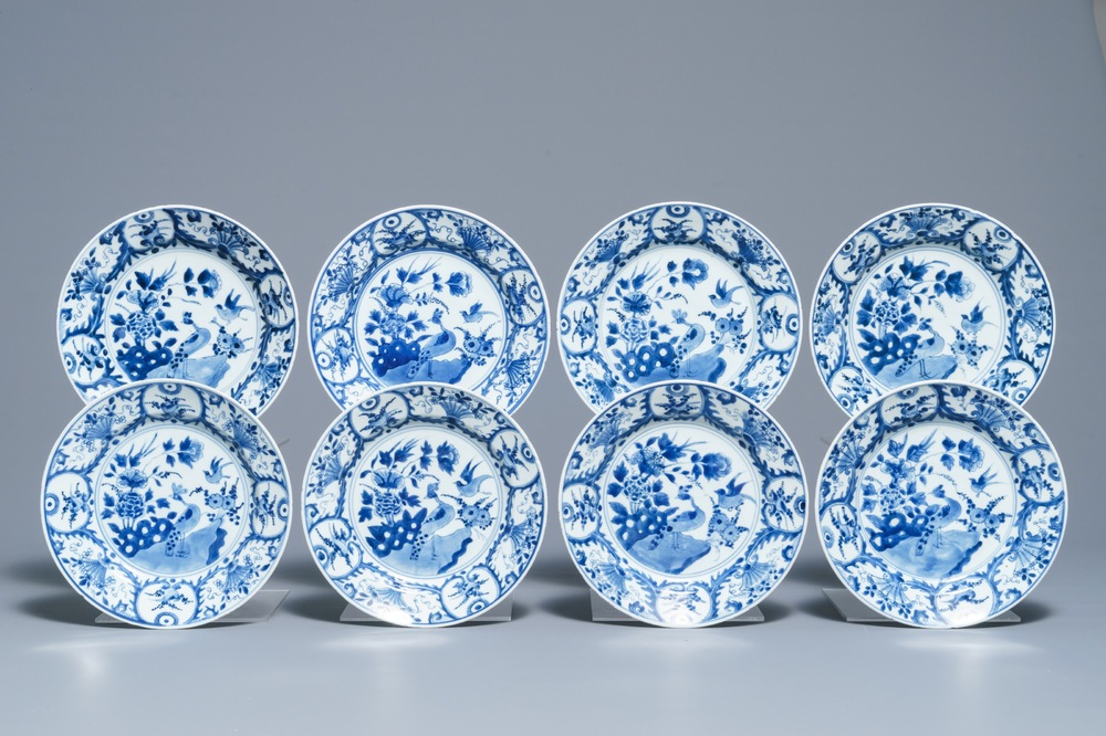 Eight Chinese blue and white plates with peacocks and birds, Kangxi